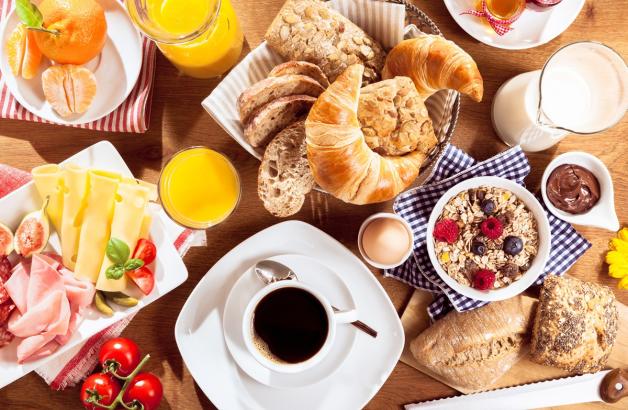 Continental breakfast, sweet and savoury with homemade cakes and  donuts 