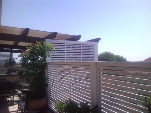 Frangisole in legno rimni e grigliati per terrazzi Grigliato legno terrazzo