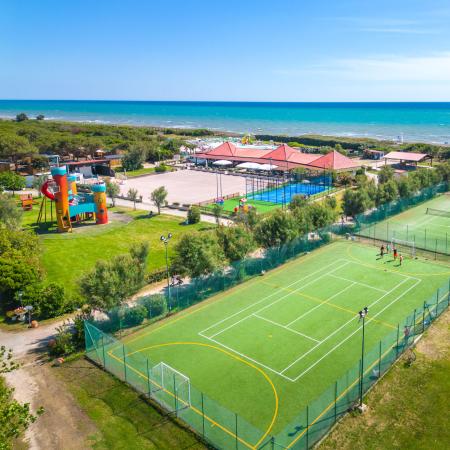 Sports field near the sea with playground.