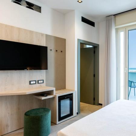 Modern room with sea view, elegant and relaxing.