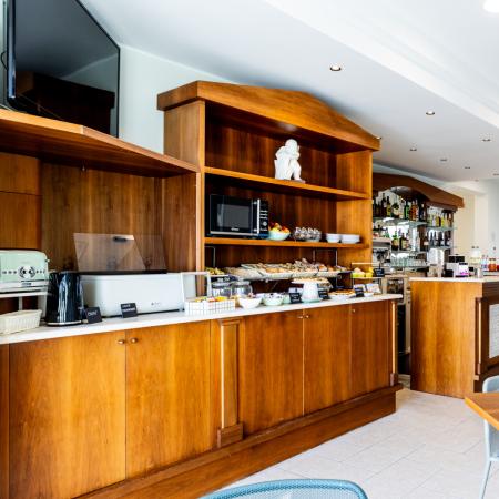 Cozy breakfast bar with warm wood and natural light.