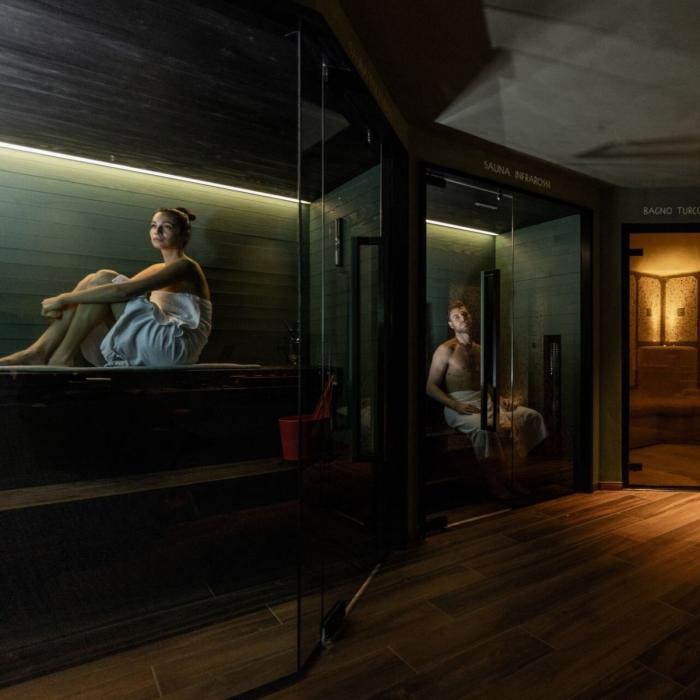 Relaxing spa atmosphere with sauna, steam bath, and cold mist shower.