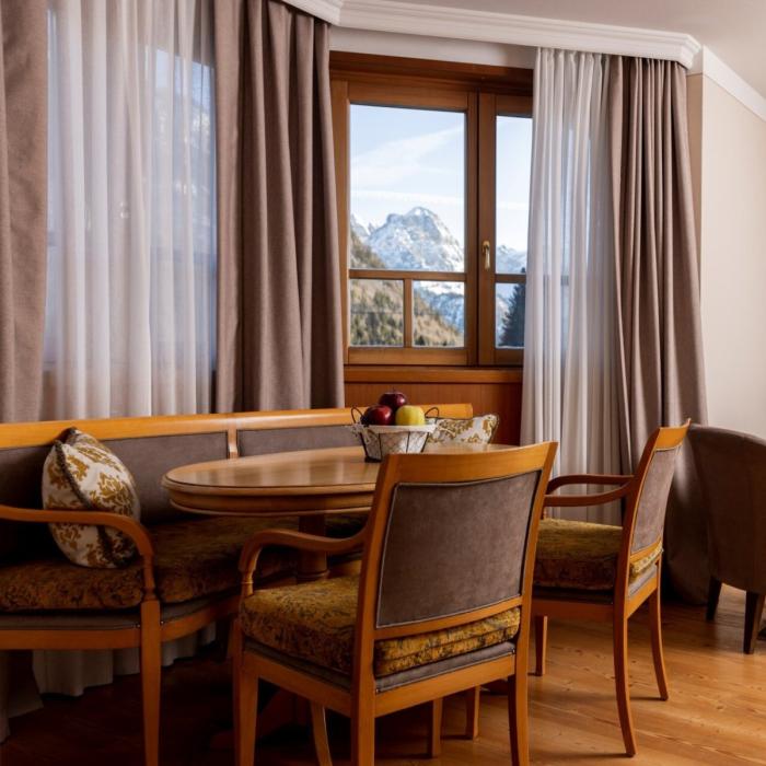 Cozy room with mountain view, warm furnishings, and relaxing atmosphere.