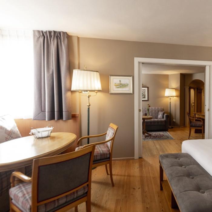 Cozy, bright room with elegant furnishings and a relaxing atmosphere.