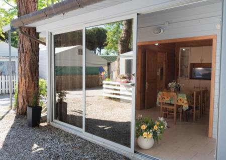 Bright entrance with set table, welcoming and serene atmosphere.