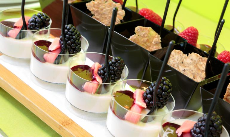 Delicious desserts with panna cotta, blackberries, and raspberries.