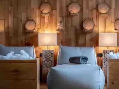 Cozy room with wooden walls and natural decorations.